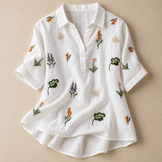 White pure cotton embroidered women’s shirt with colorful floral wildflower embroidery